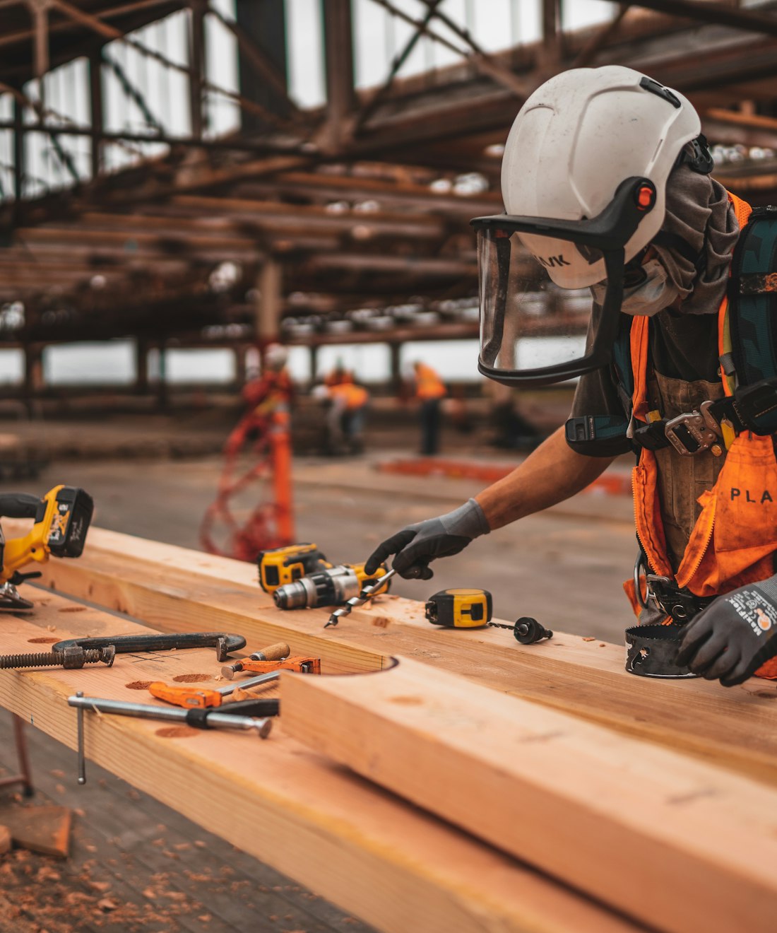 Craftsperson framing a residential renovation